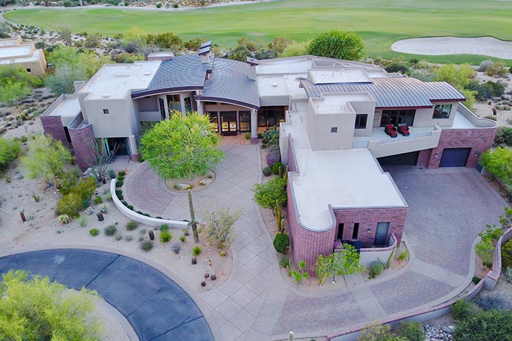 Landscaping Your Sloped Circular Driveway Expertly